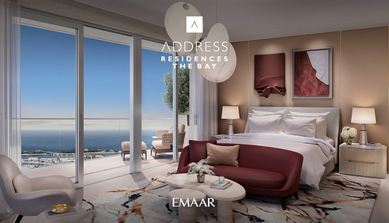 Address Residences The Bay at Emaar Beachfront by Emaar luxury bedroom with floor to ceiling windows and sea view balcony in Dubai Presented by Tohid Fetrat