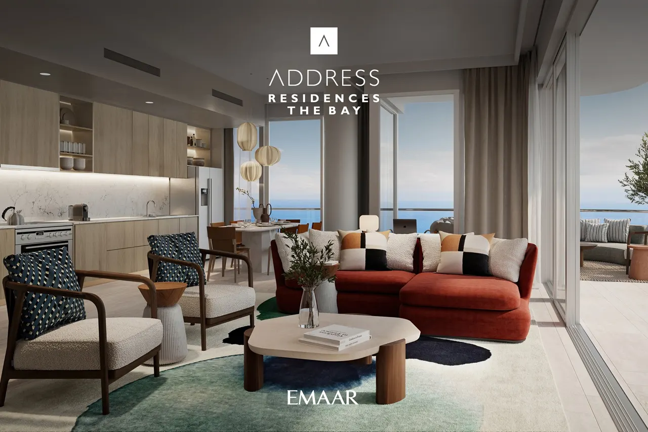Address Residences The Bay at Emaar Beachfront by Emaar modern living area with open kitchen and sea view in Dubai Presented by Tohid Fetrat