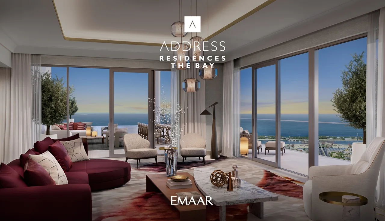 Address Residences The Bay at Emaar Beachfront by Emaar luxury living room with floor to ceiling windows and Gulf view terrace in Dubai Presented by Tohid Fetrat