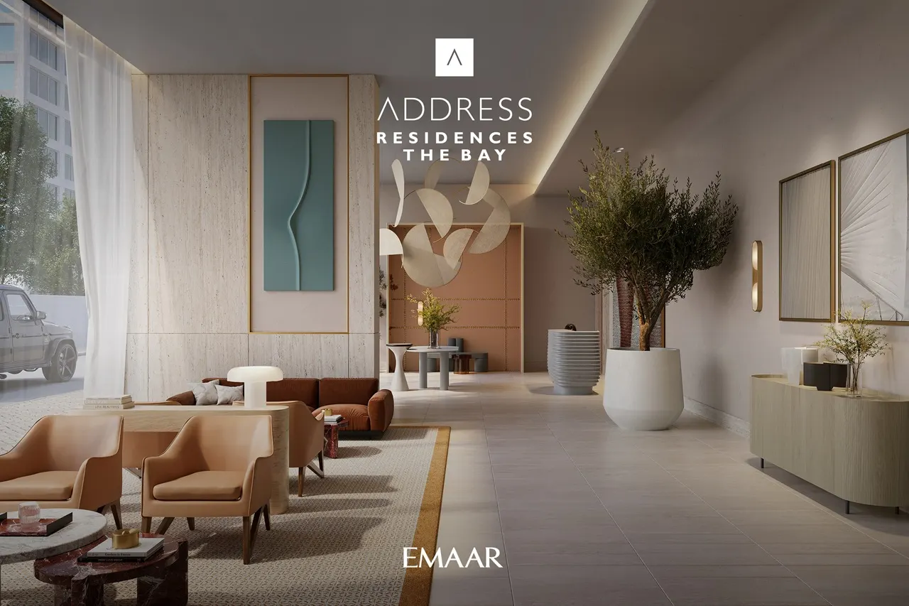 Address Residences The Bay at Emaar Beachfront by Emaar elegant lobby interior with designer seating and modern finishes in Dubai Presented by Tohid Fetrat