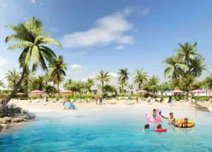 Alana at The Valley by Emaar lagoon beach with palm trees sandy shore and families enjoying water activities in Dubai - Presented by Tohid Fetrat