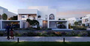 Alana at The Valley by Emaar modern villa exterior at evening with soft lighting landscaped garden and covered parking in Dubai - Presented by Tohid Fetrat