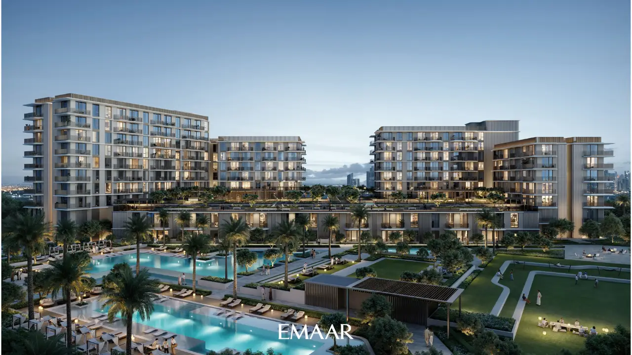 Modern apartment buildings with landscaped gardens and swimming pools at Rashid Yachts and Marina by Emaar in Dubai Presented by Tohid Fetrat