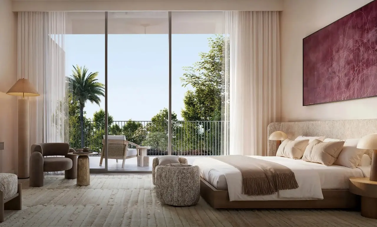 Avelia at The Valley by Emaar bedroom interior with floor to ceiling windows and balcony overlooking greenery in Dubai - Presented by Tohid Fetrat