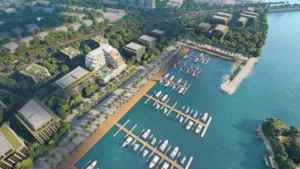 Cotier House at Dubai Islands by Imtiaz aerial view of luxury waterfront apartment development with marina promenade and yacht berths in Dubai Presented by Tohid Fetrat