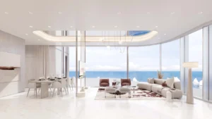 Cotier House at Dubai Islands by Imtiaz luxury apartment living and dining area with panoramic sea view floor to ceiling windows and open plan layout in Dubai Presented by Tohid Fetrat