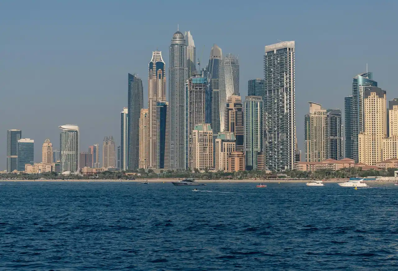 Dubai Marina skyline and waterfront towers representing Dubai Property Handover and luxury real estate living in Dubai Presented by Tohid Fetrat