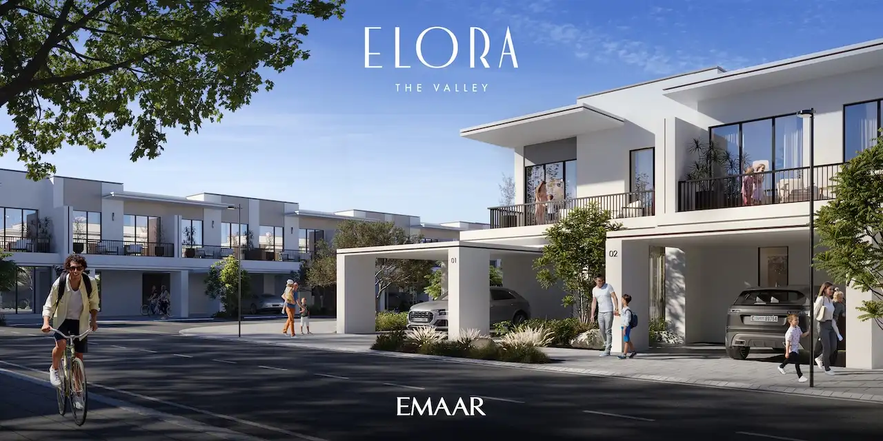 Elora at The Valley by Emaar modern townhouse community street with balconies landscaped surroundings and active neighborhood lifestyle in Dubai - Presented by Tohid Fetrat