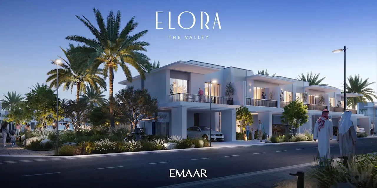Elora at The Valley by Emaar modern townhouse street view with landscaped walkways palm trees and evening community atmosphere in Dubai - Presented by Tohid Fetrat