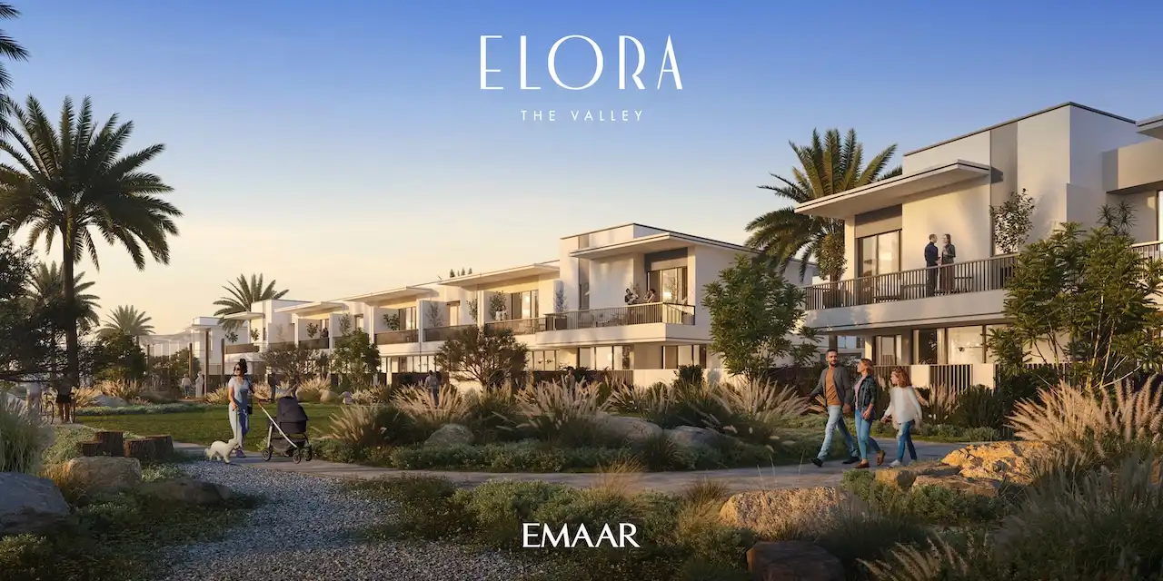 Elora at The Valley by Emaar modern townhouses overlooking landscaped park pathways with palm trees and outdoor lifestyle setting in Dubai - Presented by Tohid Fetrat