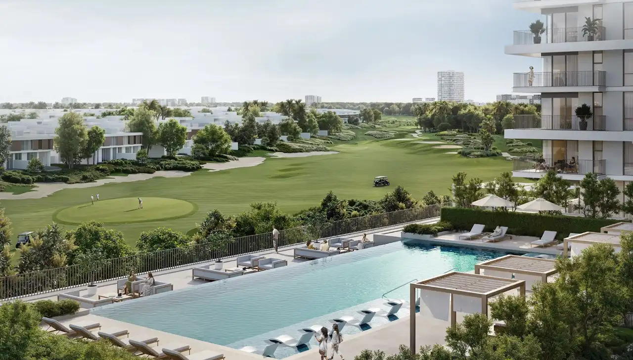 Golf Meadow at Emaar South by Emaar swimming pool with lounge areas overlooking golf course landscaped greenery and residential buildings in Dubai - Presented by Tohid Fetrat