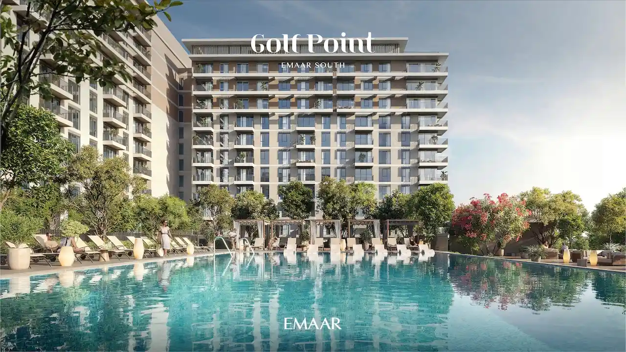 Golf Point at Emaar South by Emaar swimming pool in front of residential building with sun loungers cabanas and landscaped surroundings Presented by Tohid Fetrat