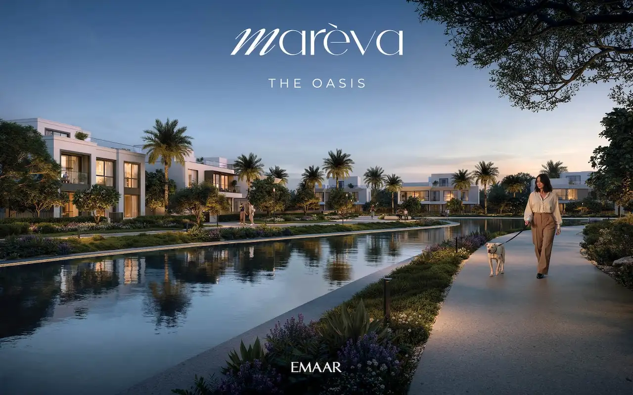 Mareva at The Oasis by Emaar evening lagoon walkway with waterfront villas, landscaped paths, and peaceful outdoor lifestyle in Dubai - Presented by Tohid Fetrat
