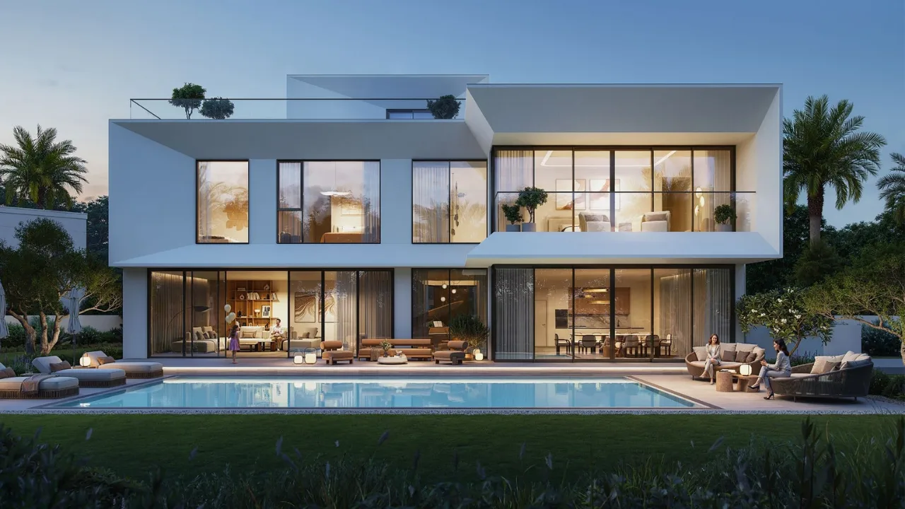 Mareva at The Oasis by Emaar modern villa at evening with private pool, illuminated interiors, and outdoor seating areas in Dubai - Presented by Tohid Fetrat