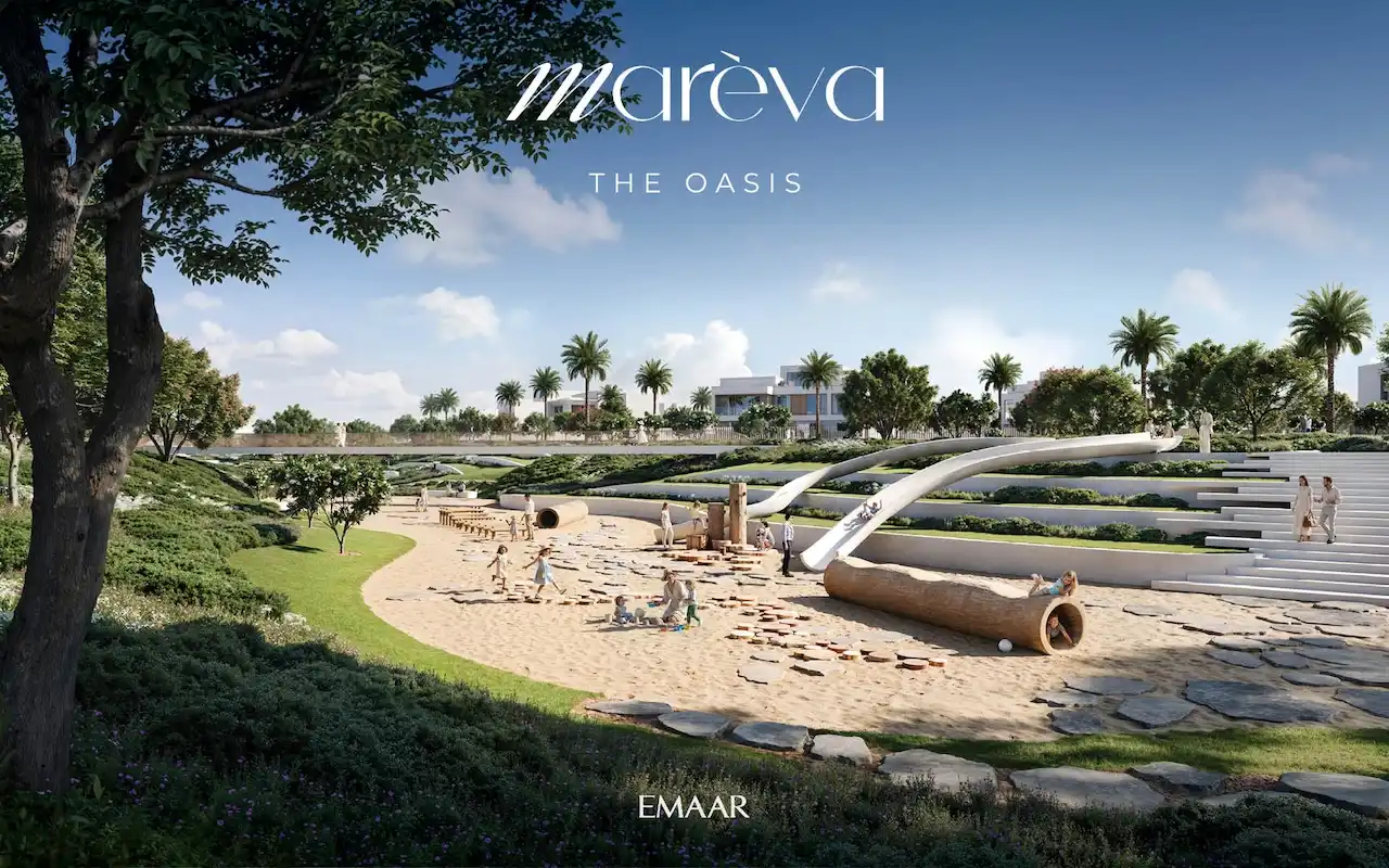 Mareva at The Oasis by Emaar outdoor kids playground with sand area, slides, and landscaped park setting in Dubai - Presented by Tohid Fetrat