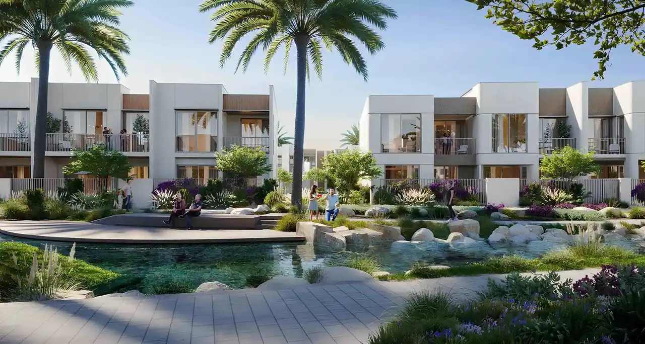 Nima at The Valley by Emaar modern villas overlooking landscaped water features with greenery and pedestrian areas in Dubai - Presented by Tohid Fetrat
