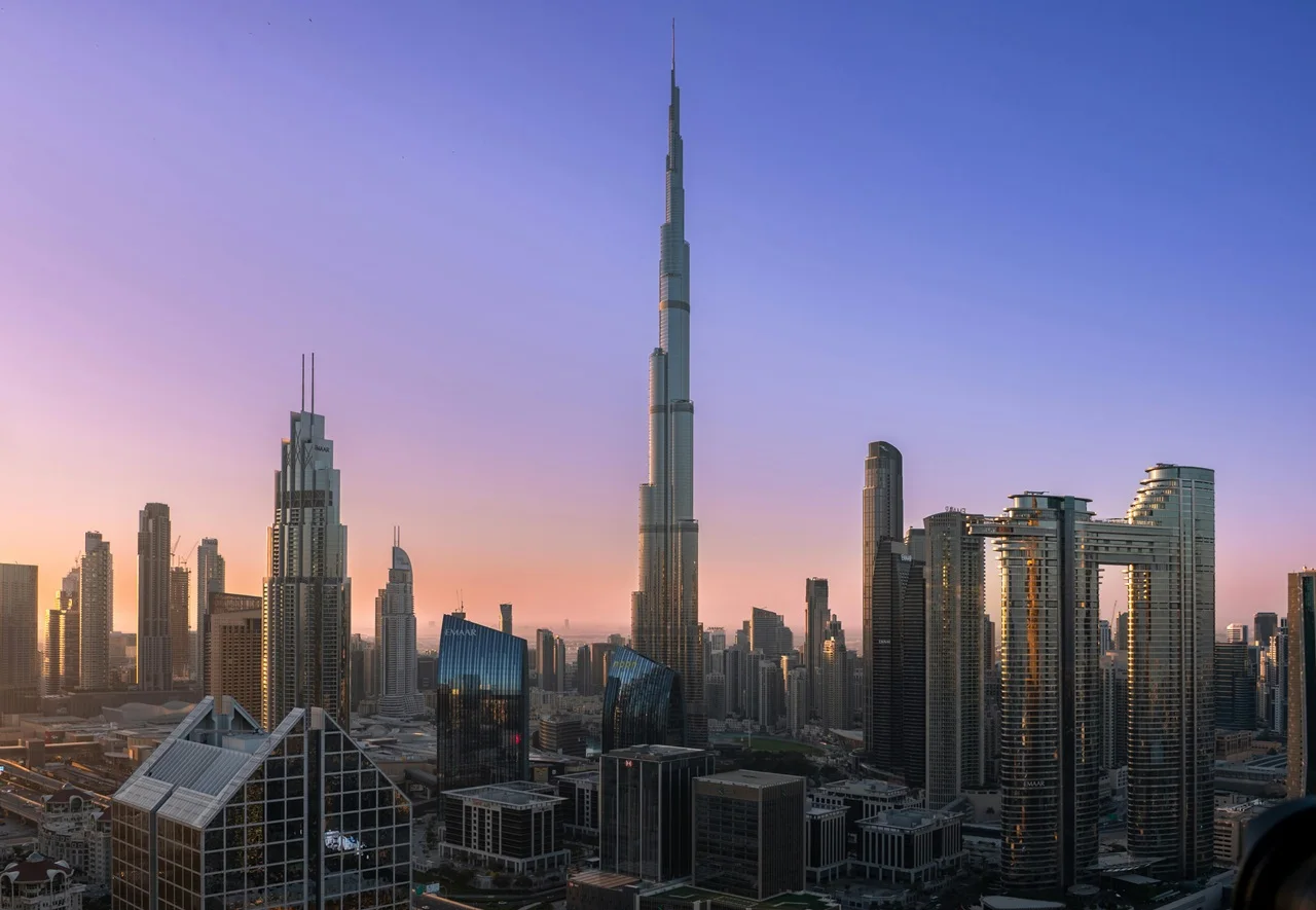 Off plan property insurance in Dubai and how to protect your investment during off plan purchase with Burj Khalifa skyline view and urban development Presented by Tohid Fetrat