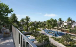 Ovelle at The Valley by Emaar landscaped community park with playground walking paths and palm trees viewed from a balcony in Dubai - Presented by Tohid Fetrat