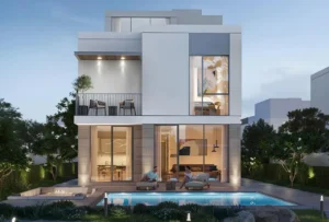 Ovelle at The Valley by Emaar modern villa exterior with balcony terrace large glass windows and private pool at sunset in Dubai - Presented by Tohid Fetrat