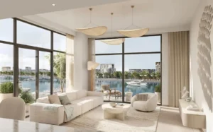 Porto View at Rashid Yachts & Marina by Emaar living room interior with large windows marina view soft furnishings and natural light in Dubai - Presented by Tohid Fetrat