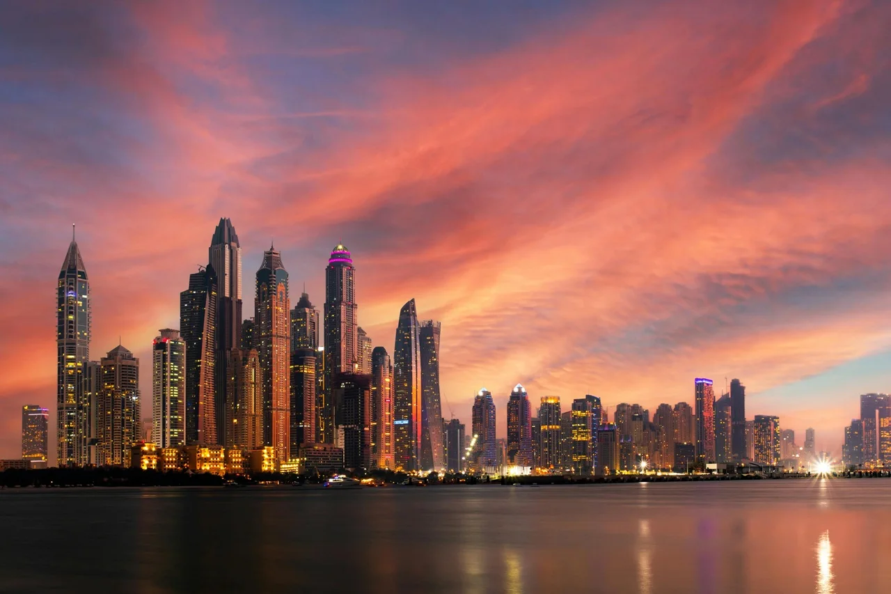 Property insurance claims process in Dubai with skyline at sunset illustrating steps to file a property insurance claim for real estate protection Presented by Tohid Fetrat