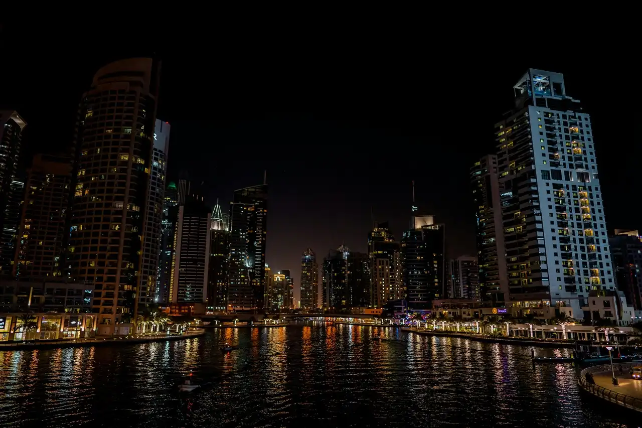Property insurance for overseas investors in Dubai showing Dubai Marina skyline at night for the common mistakes overseas investors make section. Presented by Tohid Fetrat