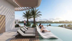 infinity pool seating area at Sunset Bay Grand by Imtiaz at Dubai Islands Presented by Tohid Fetrat