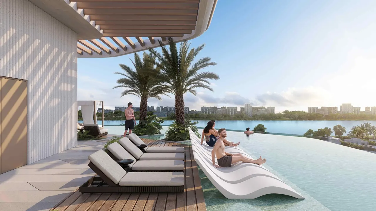 infinity pool seating area at Sunset Bay Grand by Imtiaz at Dubai Islands Presented by Tohid Fetrat