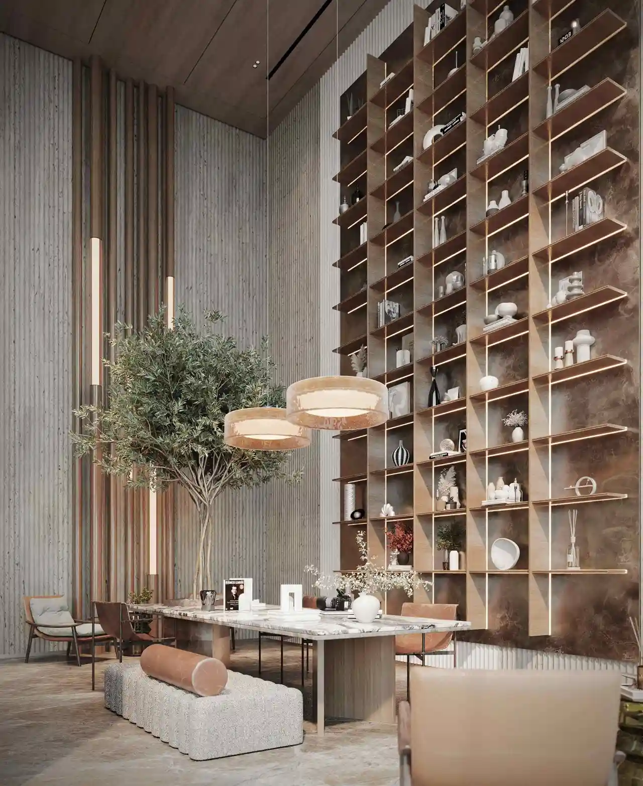 luxury library lounge with marble table pendant lights and double height shelving at Sunset Bay Grand by Imtiaz Dubai Islands Presented by Tohid Fetrat