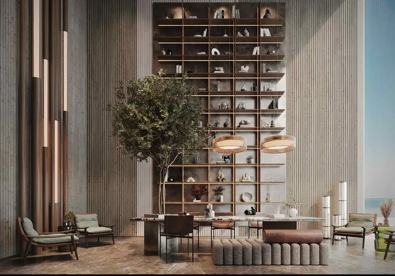 luxury lobby with double height shelving feature wall marble table and seating at Sunset Bay Grand by Imtiaz Dubai Islands Presented by Tohid Fetrat