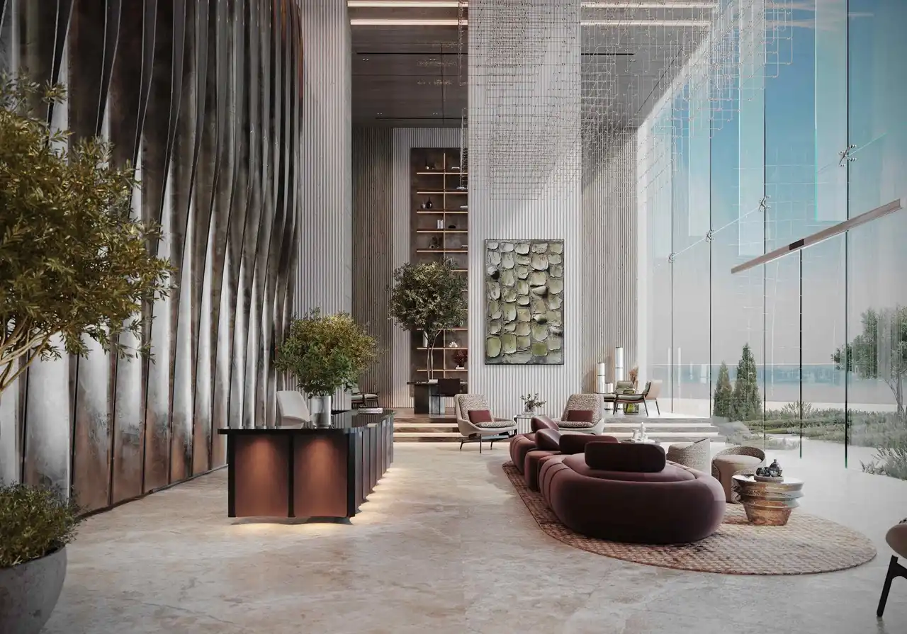 luxury lobby seating with sculptural sofa double height space and sea view at Sunset Bay Grand by Imtiaz Dubai Islands Presented by Tohid Fetrat