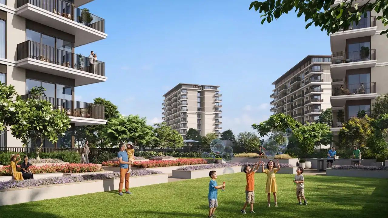 Vista Ridge at Emaar South by Emaar Properties landscaped residential garden courtyard with families and modern apartment buildings in Dubai - Presented by Tohid Fetrat