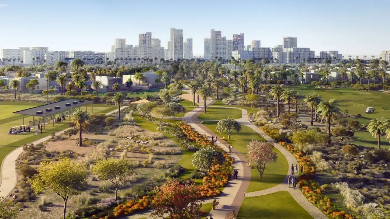 Vista Ridge at Emaar South by Emaar Properties landscaped community park with walking paths palm trees and modern residential buildings in Dubai - Presented by Tohid Fetrat