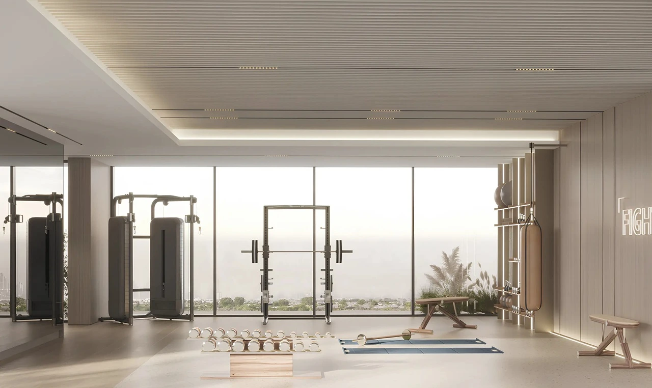 Amazonia at Al Jaddaf Waterfront by Palladium Developments modern gym with strength equipment weights and floor to ceiling windows in Dubai - Presented by Tohid Fetrat