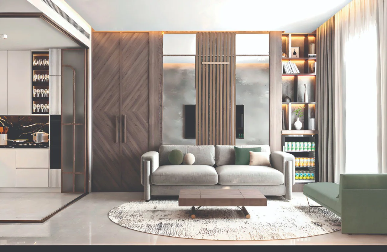 Amazonia at Al Jaddaf Waterfront by Palladium Developments open plan living room with modern sofa wooden accents shelving and integrated kitchen in Dubai - Presented by Tohid Fetrat