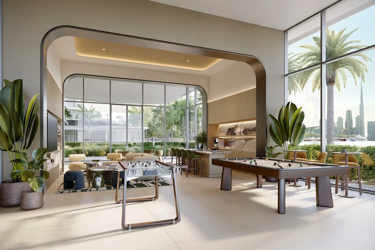 Artistry Two Residences by Select Group indoor amenities games lounge with pool table seating area and garden views in Dubai - Presented by Tohid Fetrat