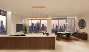Artistry Two Residences by Select Group 3 bedroom open kitchen and dining area with island counter and Dubai skyline view in Dubai - Presented by Tohid Fetrat