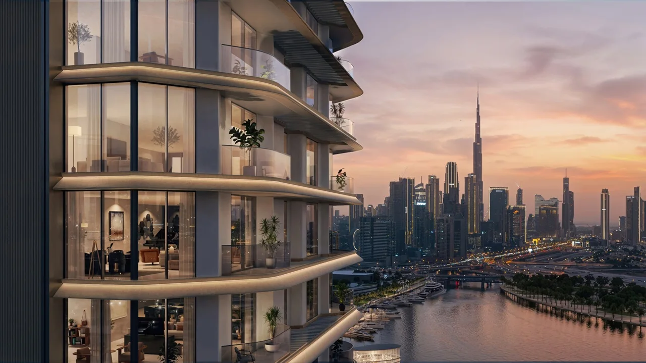 Artistry Two Residences by Select Group curved balconies exterior with Dubai skyline and waterfront canal view at sunset in Dubai - Presented by Tohid Fetrat