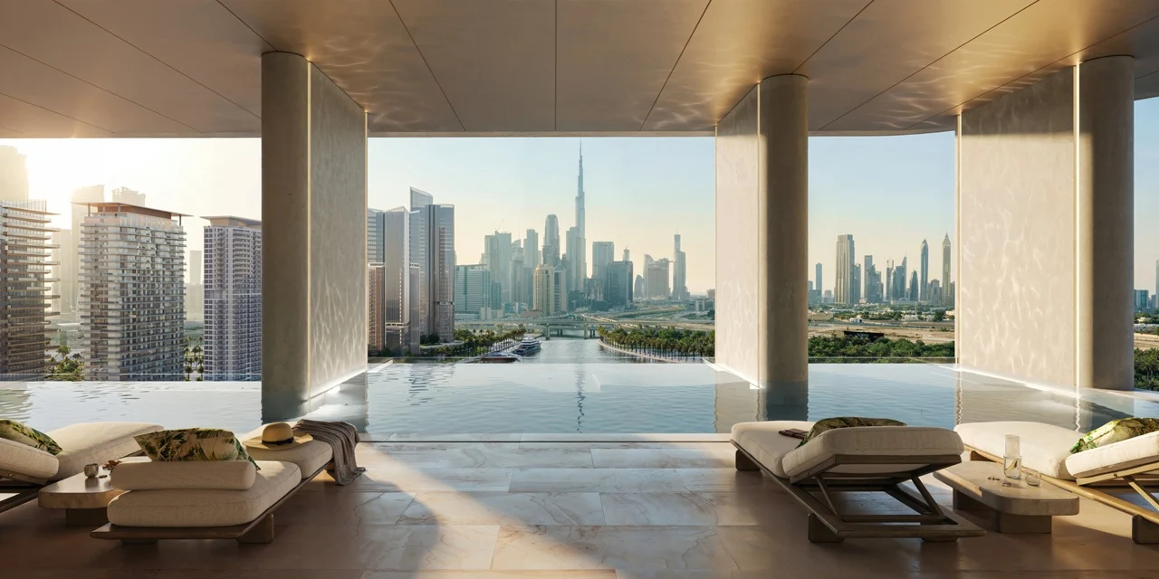 Artistry Two Residences by Select Group infinity pool with lounge seating and panoramic Dubai skyline view in Dubai - Presented by Tohid Fetrat