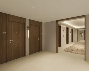 Artistry Two Residences by Select Group lobby corridor with apartment entrances and elevator area featuring modern finishes in Dubai - Presented by Tohid Fetrat