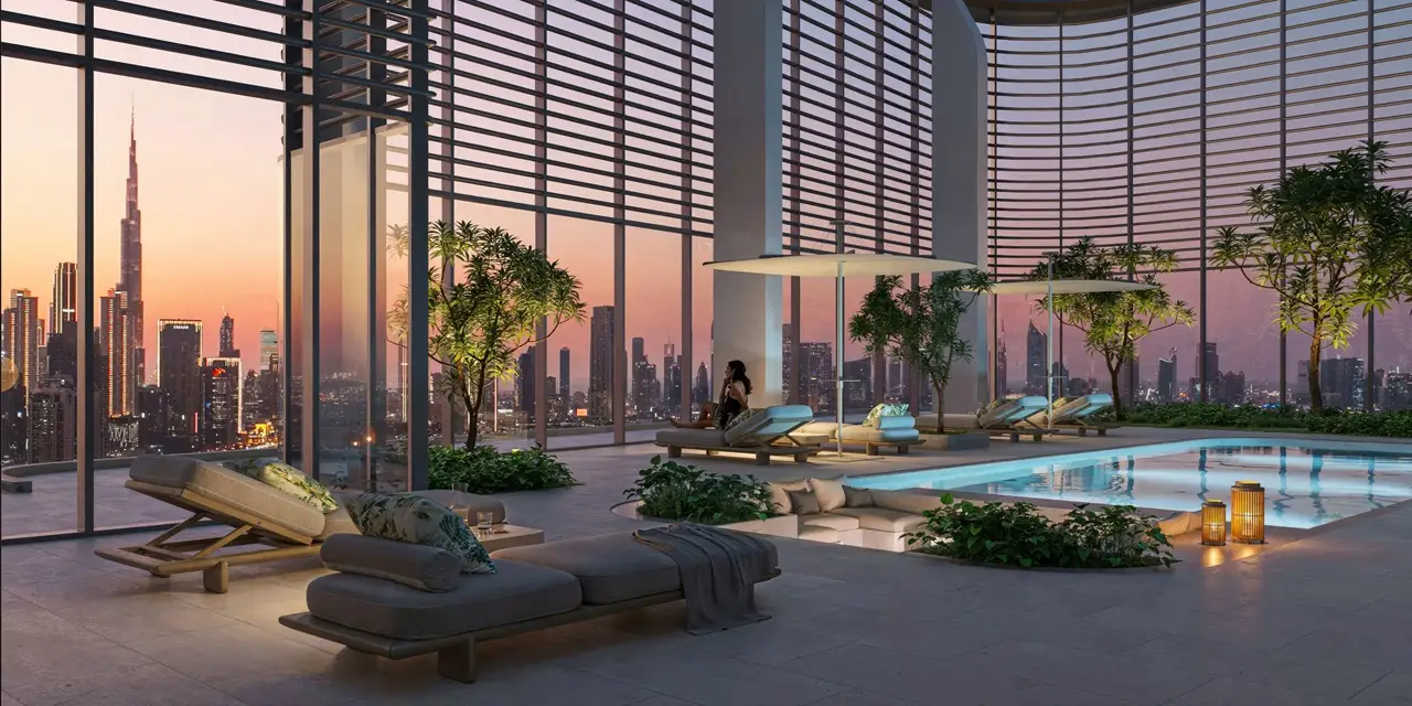 Artistry Two Residences by Select Group penthouse rooftop pool with lounge seating and Dubai skyline sunset view in Dubai - Presented by Tohid Fetrat