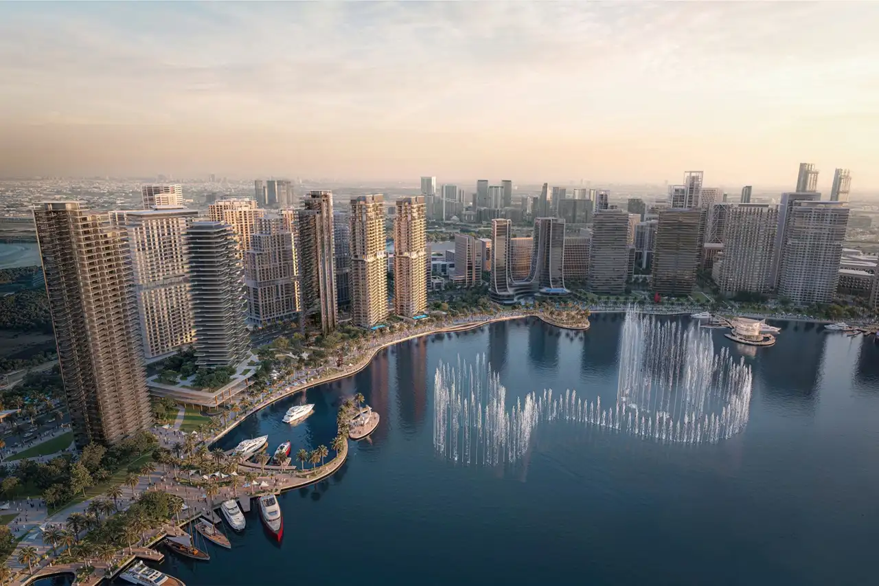 Artistry Two Residences by Select Group waterfront community day view with marina skyline and fountain feature in Dubai - Presented by Tohid Fetrat
