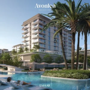 Avonlea at Rashid Yachts & Marina by Emaar residential tower beside palm lined swimming pool and landscaped leisure area in Dubai Presented by Tohid Fetrat