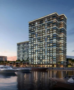 Baystar by Vida at Rashid Yachts & Marina by Emaar waterfront residential building with balconies overlooking marina and yachts at sunset in Dubai - Presented by Tohid Fetrat