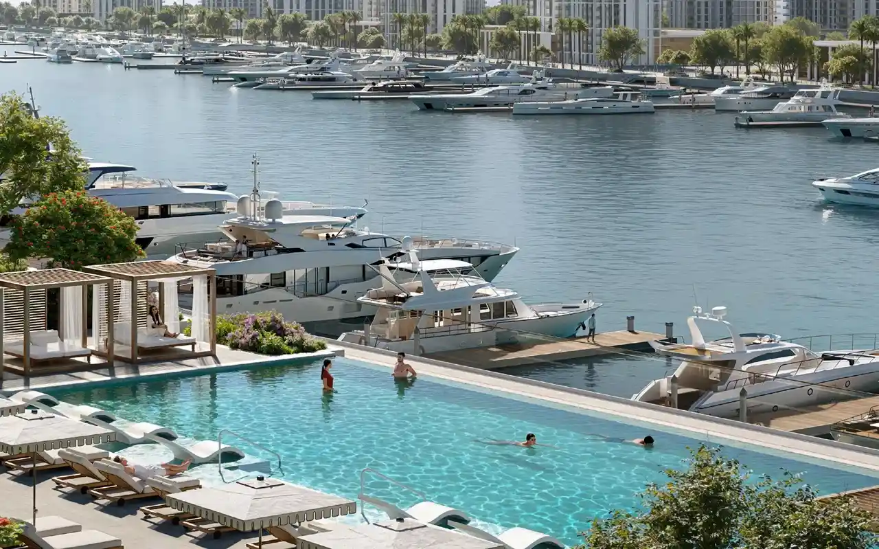 Baystar by Vida at Rashid Yachts & Marina by Emaar infinity pool overlooking marina with yachts and waterfront skyline in Dubai - Presented by Tohid Fetrat