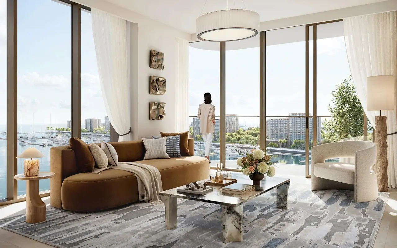Baystar by Vida at Rashid Yachts & Marina by Emaar spacious living room with floor to ceiling windows overlooking marina and waterfront in Dubai - Presented by Tohid Fetrat