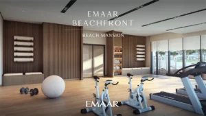 Beach Mansion at Emaar Beachfront by Emaar indoor gym with fitness equipment and modern training space in Dubai Presented by Tohid Fetrat