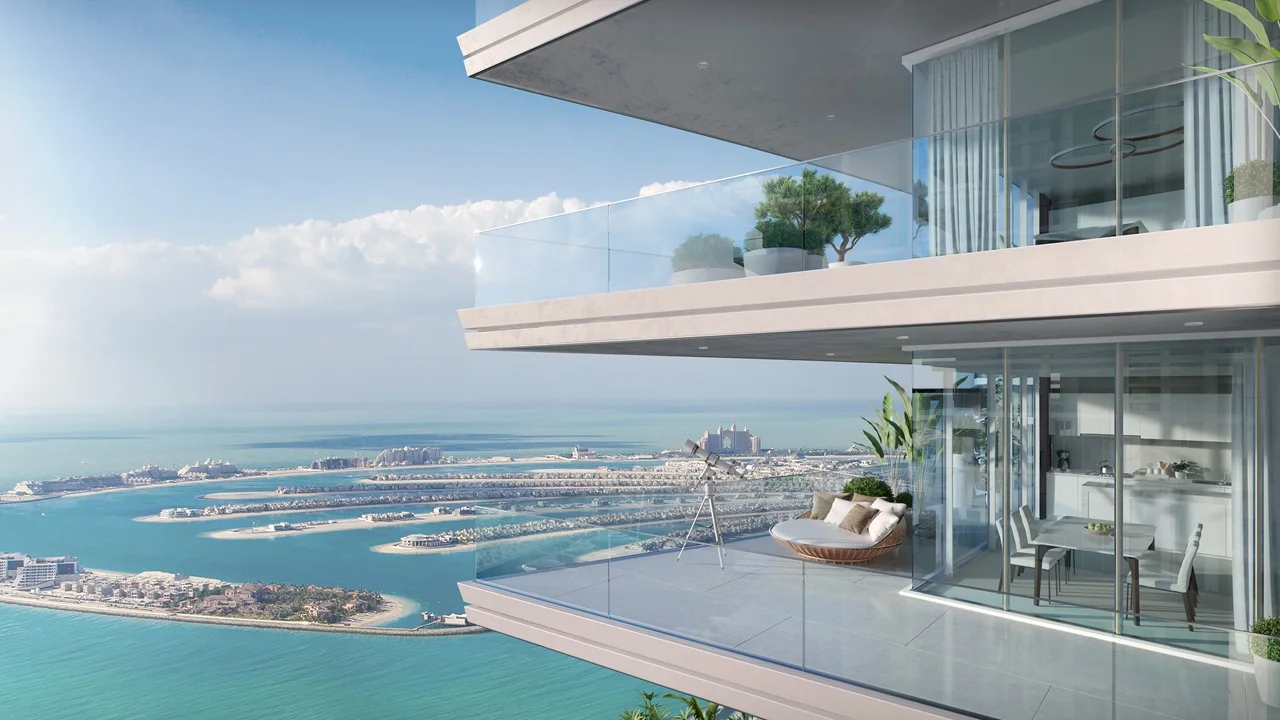 Beach Vista at Emaar Beachfront by Emaar balcony terrace with glass railing outdoor seating and panoramic Palm view over the Gulf in Dubai - Presented by Tohid Fetrat