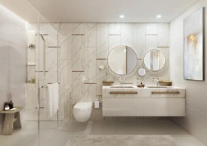 Beach Vista at Emaar Beachfront by Emaar modern bathroom interior with marble finishes double vanity mirrors and glass shower enclosure in Dubai - Presented by Tohid Fetrat