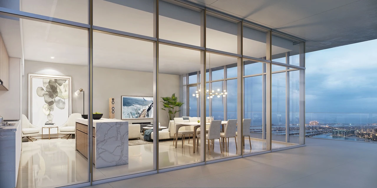 Beach Vista at Emaar Beachfront by Emaar open plan living and dining area with floor to ceiling glass walls and sea view in Dubai - Presented by Tohid Fetrat